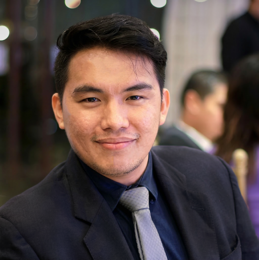 Professional headshot of John Niero S. Medina, freelance web developer and virtual assistant.